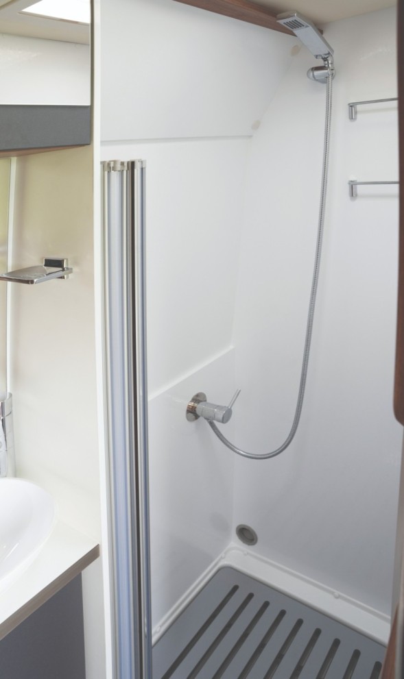 The washroom is fitted with a Thetford cassette loo and a shower Pilote V630LG washroom