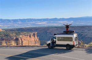 Campervan overlooking a canyon (photo courtesy of Unspalsh)