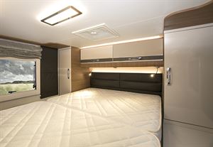 An island bed so both people can get in and out