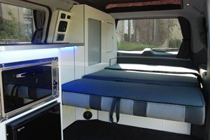 Travel seats laid flat to create the bed