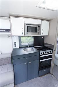 The Sterling Continental 650 has grey-fronted kitchen units