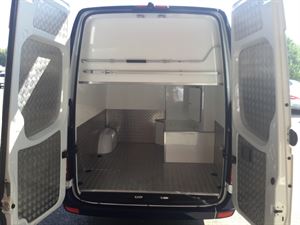 There is a large storage area in the rear under the fixed bed