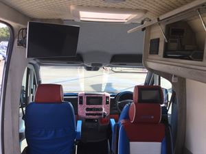 The lounge features a large TV