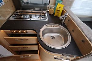The L-shaped galley in longer B-Modern Comfort 680