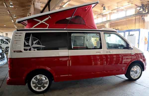 The all-new VW campervan from Westfalia has a distinctive red canvas in its pop-top roof The all-new VW campervan from Westfalia has a distinctive red canvas in its pop-top roof