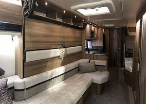 The double bed folds down from abiove the sofa