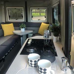The interior rear U-shaped lounge of the Rebel U