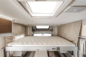 The drop down bed in the Rimor Seal 99 Plus motorhome