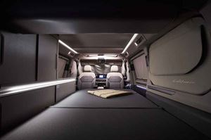 The rear double bed in the new VW California with blackout blinds in place (photo courtesy VW Commercial Vehicles)
