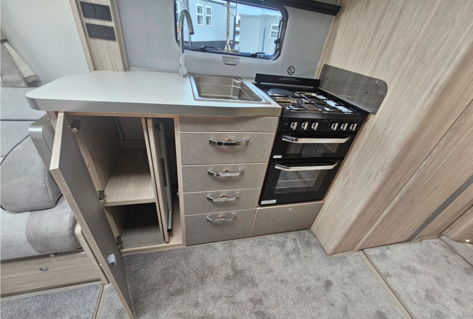 The kitchen inside the Elddis Crusader Tempest 60th Special Edition