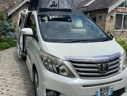 Toyota It is a newly converted Toyota Alphard from . with rock'n'roll bed and pop top 2012