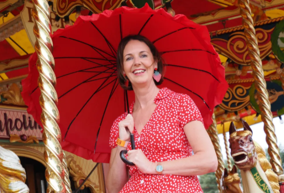 Lady riding the carousel
