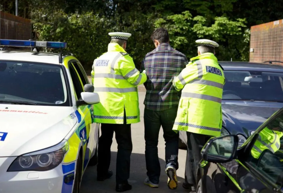 Police arresting a thief