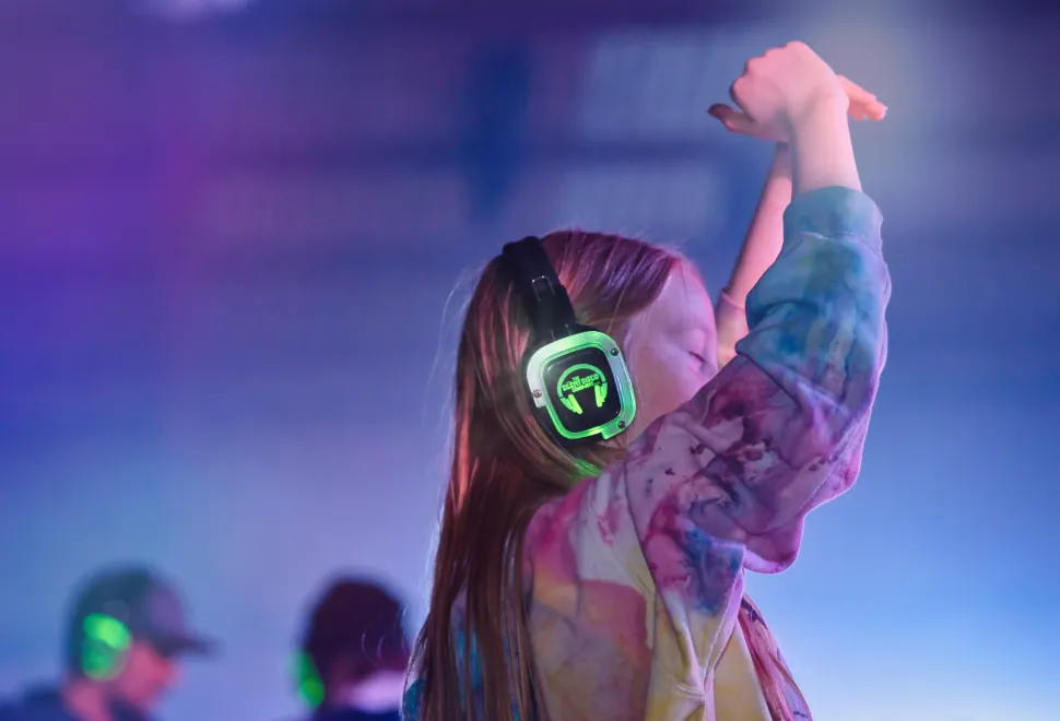 enjoying he silent disco in the Beach Barn
