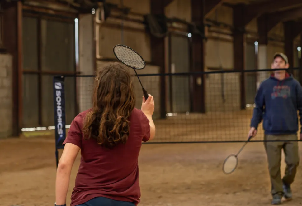 Badminton in the beach barn at Campervan Campout