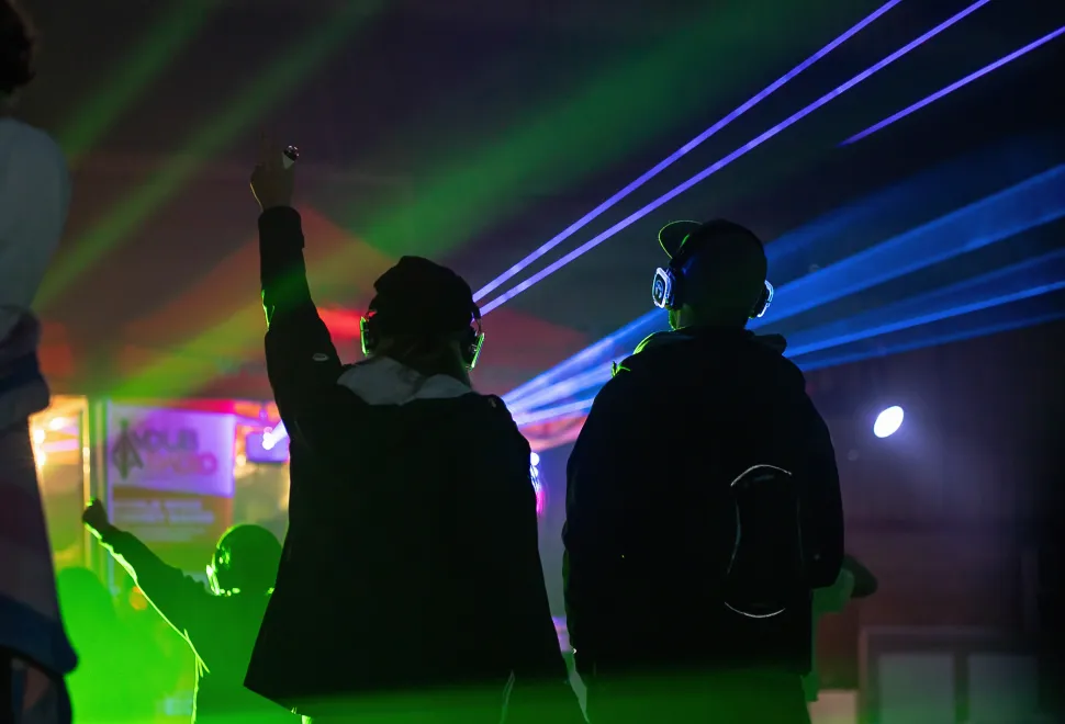 Silent disco in full swing on the beach barn at Campervan Campout Festival