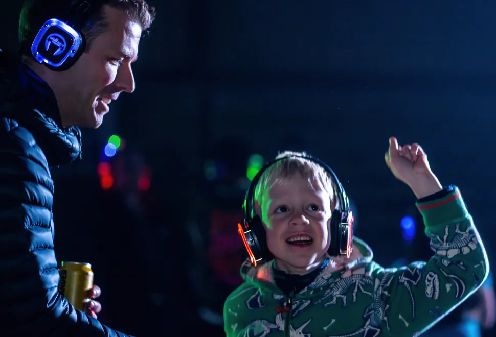 Families enjoying the silent disco at Campervan Campout Festival