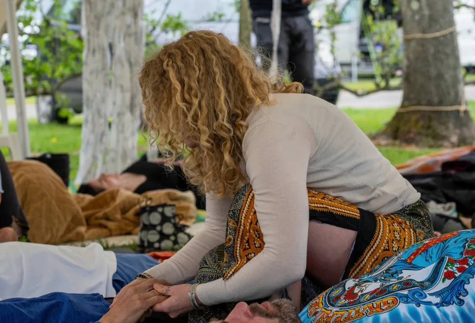 Festival goers making the most of the wellness sanctuary at Campervan Campout