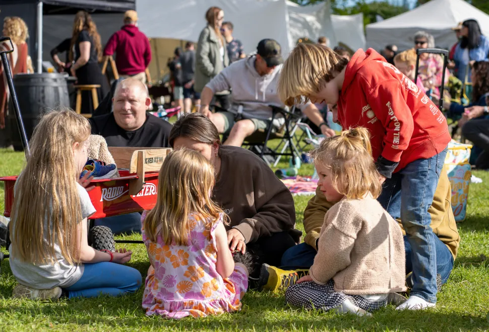 Young family enjoying the environment at the Campervan Campout Festival