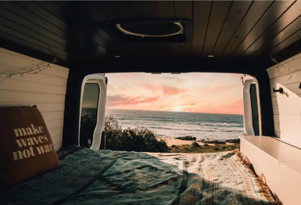 A campervan at the sea