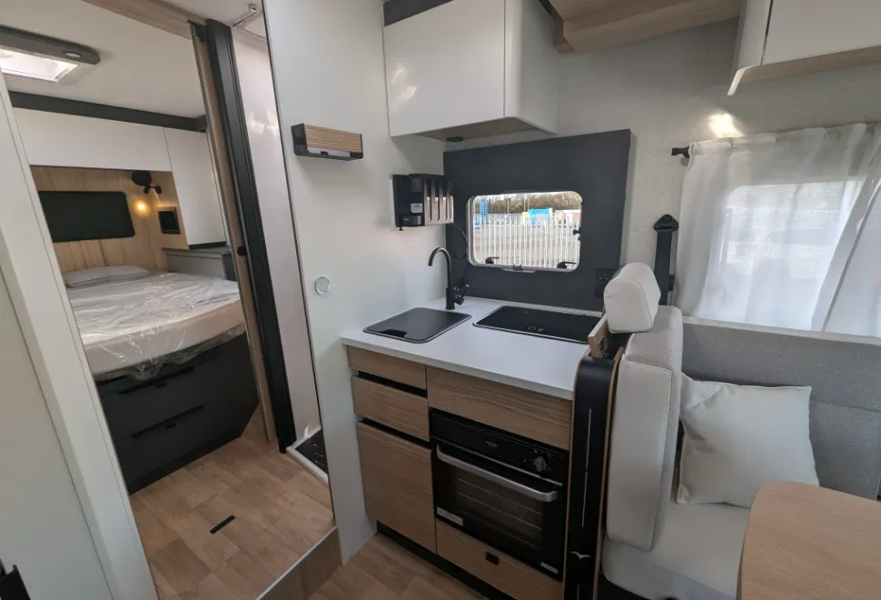 The kitchen comes with an optional oven but this does impact storage here
