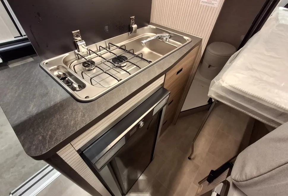 The kitchen inside the Rimor Horus 12 campervan