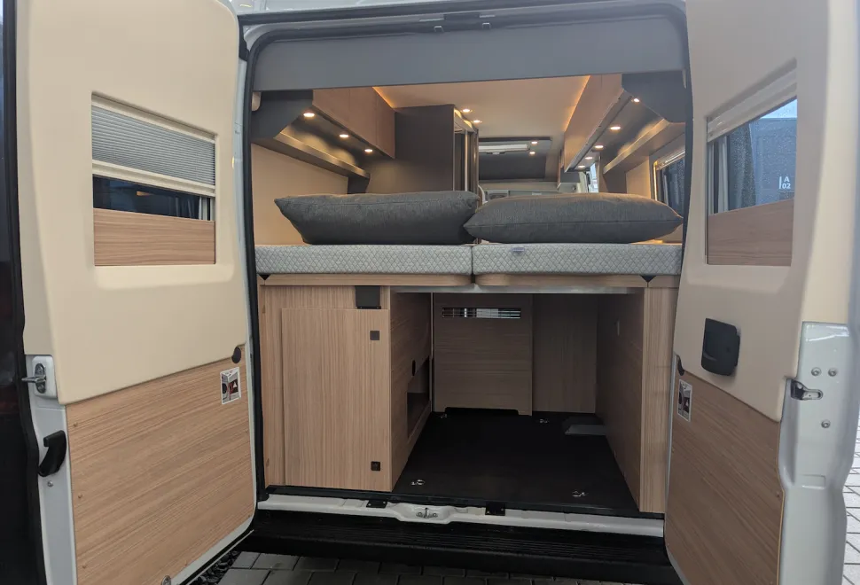 Malibu Relax Active campervan rear doors open showing bed