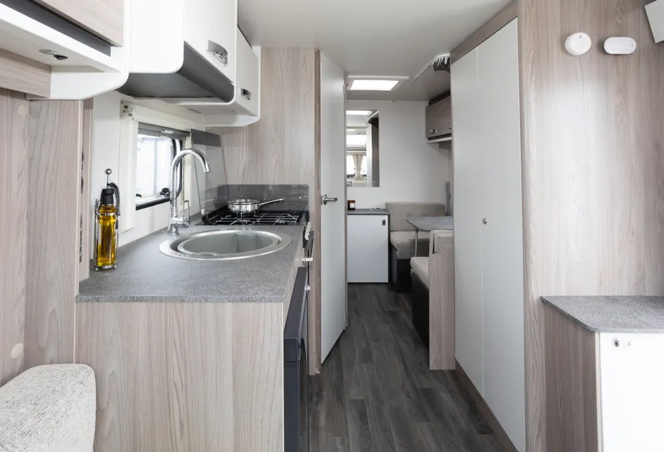 The washroom door is set at a slight angle to maximise on corridor space