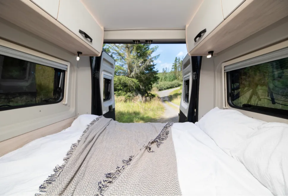 The bed inside the Xplore CV X8 pop-top