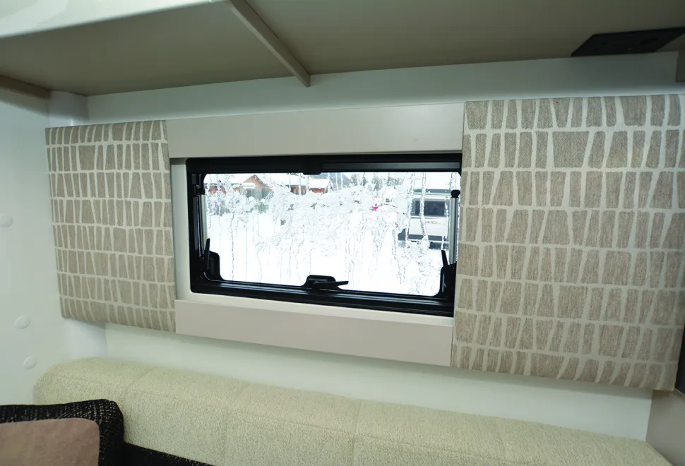 Bailey Alora 69-4S motorhome panels either side of a frosty window