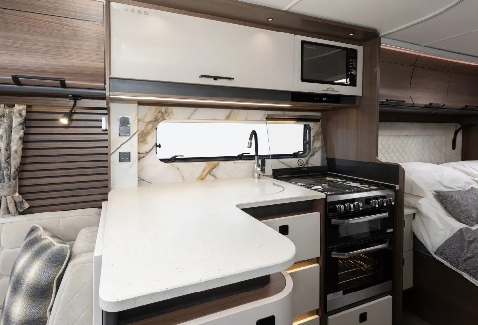 The L-shape of the kitchen creates a large surface