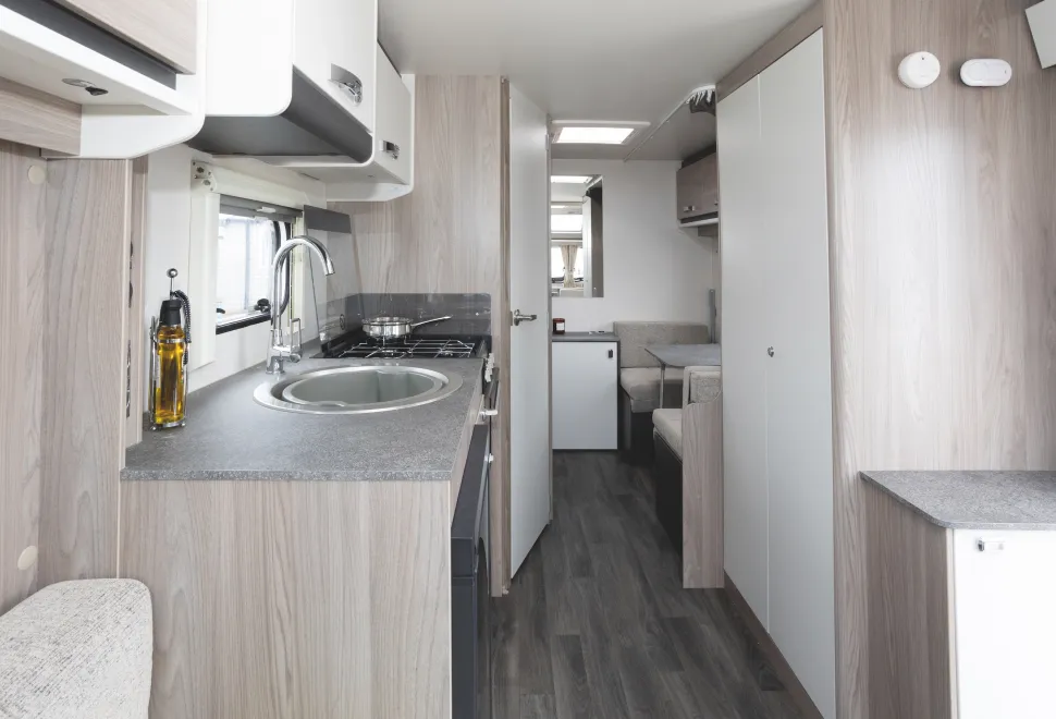 The washroom door is set at a slight angle to maximise on corridor space
