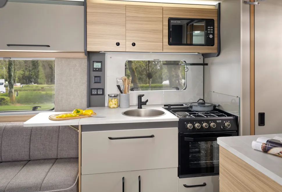 The kitchen inside the Bailey Phoenix 640 Black Edition