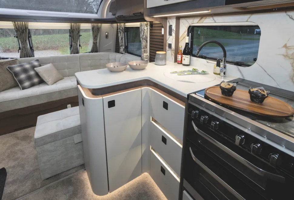 The kitchen surface reaches more than a metre into the centre of the caravan