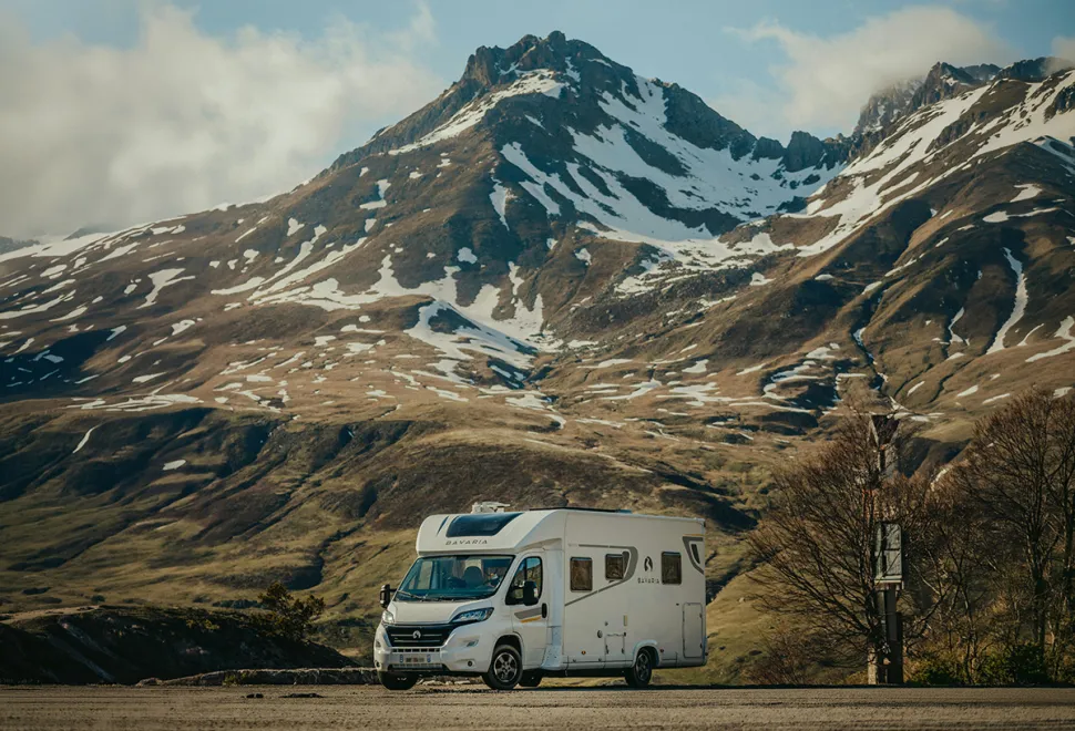 Motorhome with mountains behind