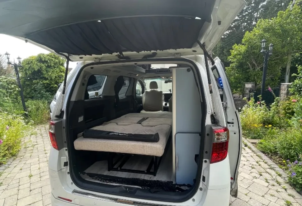 Toyota It is a newly converted Toyota Alphard from . with rock'n'roll bed and pop top 2012