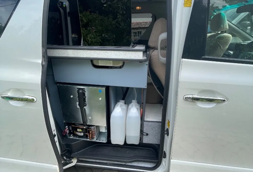 Toyota It is a newly converted Toyota Alphard from . with rock'n'roll bed and pop top 2012