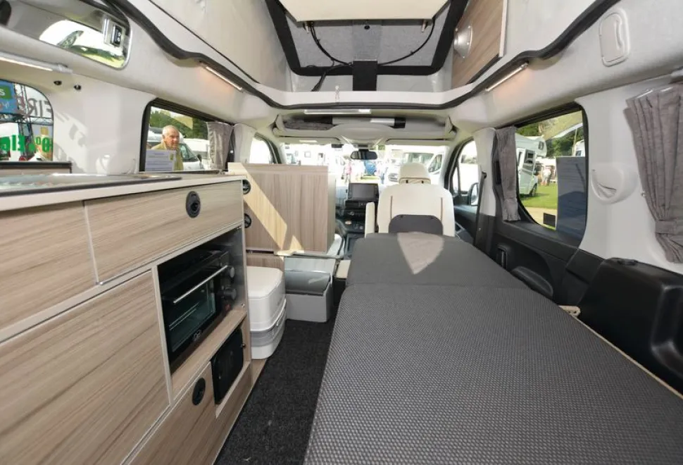 The Wheelhome Vikenze III-e 4TS XL rising roof campervan bed