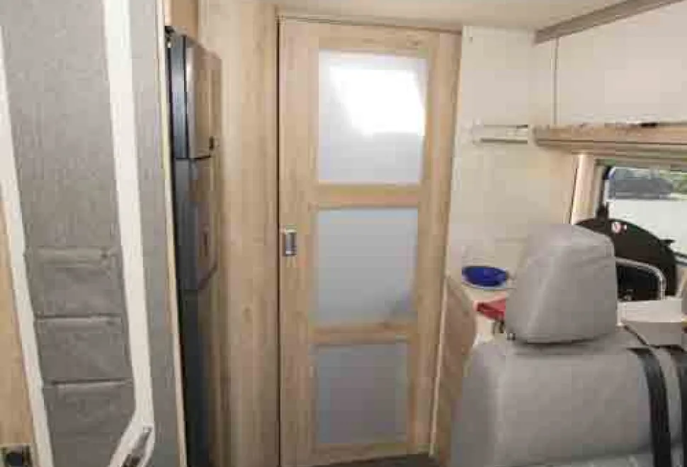 Eura-Mobil-Integra-door-to-bedroom-78550