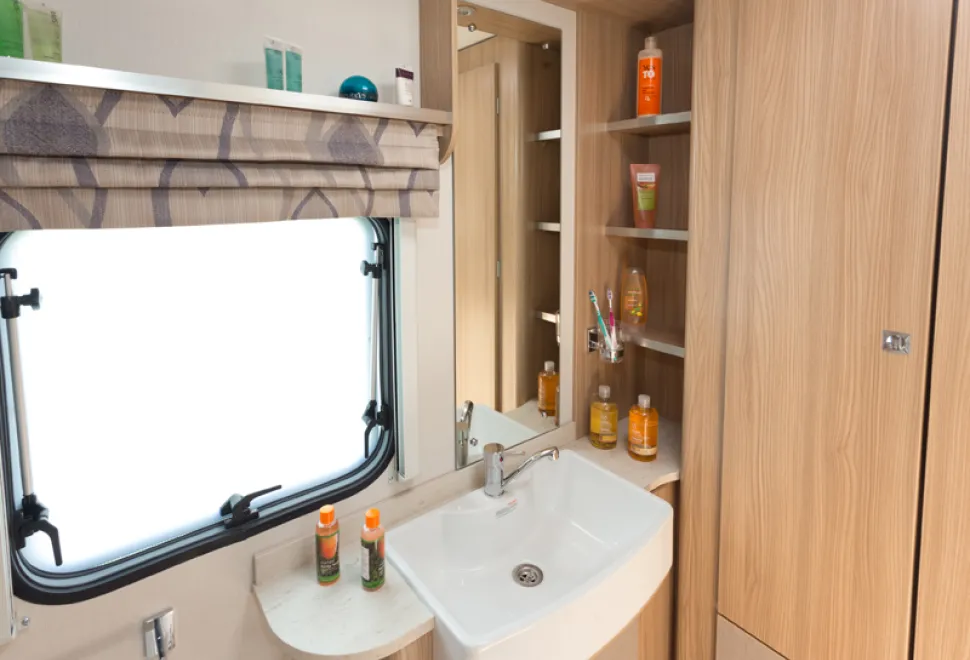 web-5-Plenty-of-shelving-in-the-rear-shower-room-31954