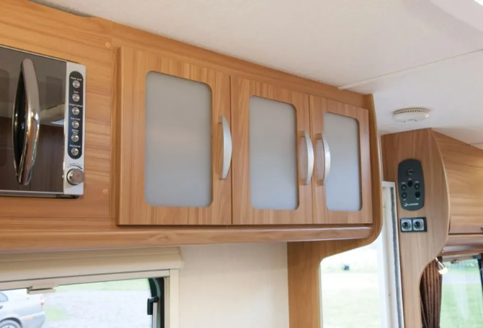 rhp_Three top kitchen cabinets have opaque frosted plastic door inserts