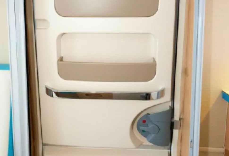 Every-inch-of-availabel-psace-is-turned-into-some-form-of-storage,-incduing-these-pockets-on-the-door-16318