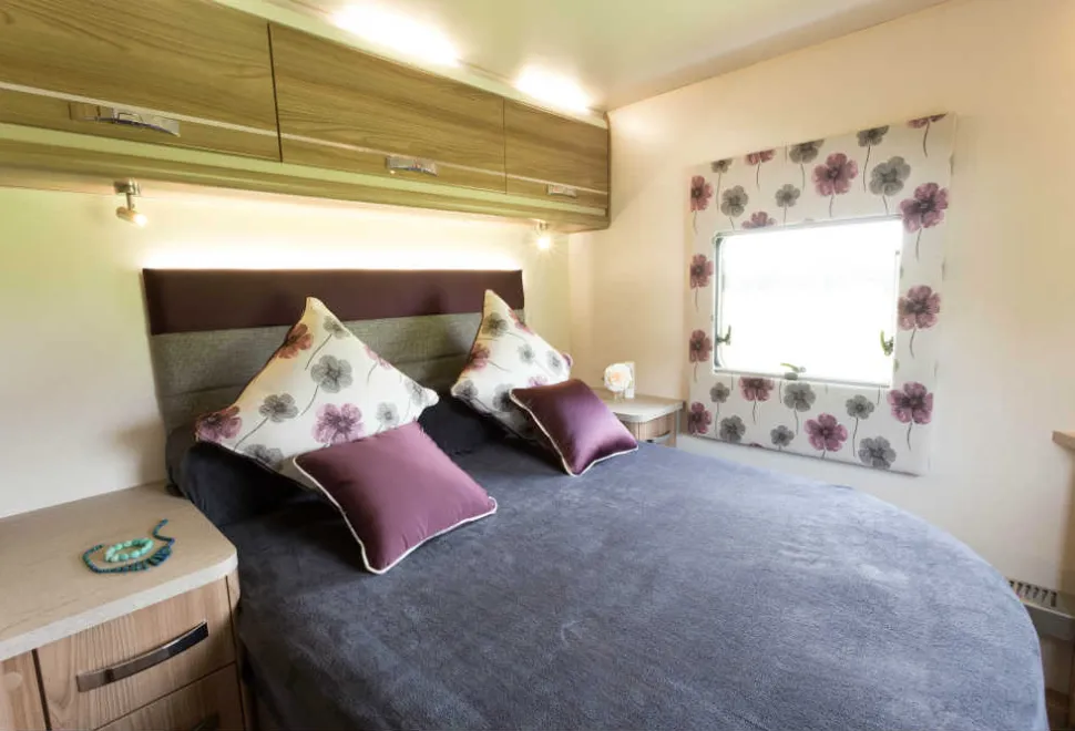 We-love-the-fabric-panels-aroiund-the-bedroom-windows!-48878