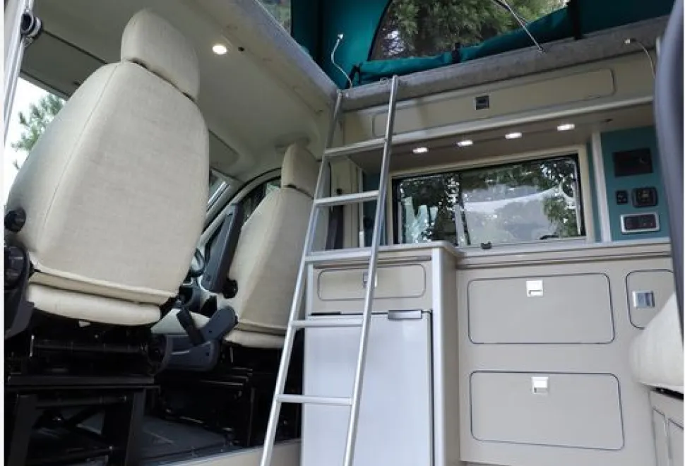 The-Orange-Trouvaille-campervan-bed-access-53756