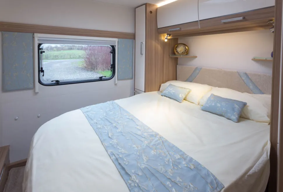 web-5-A-unique-layout-bedroom-with-upholstered-panels-bordering-the-window-43277