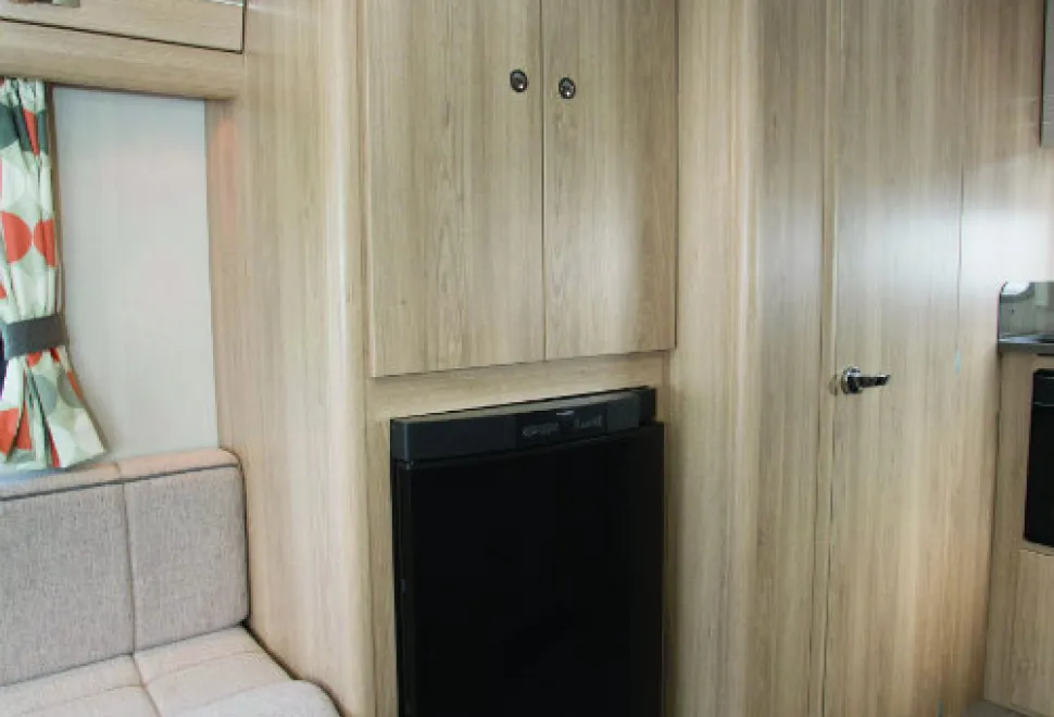 The-wardrobe-is-above-the-fridge---an-ingenious-use-of-space-w500-90058