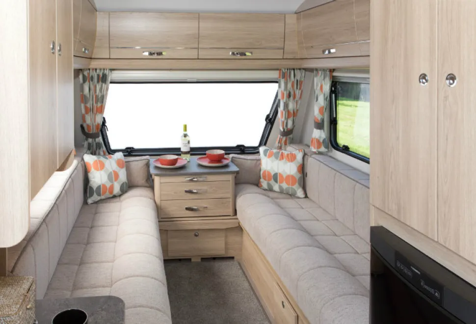 Bright-mango-orange-in-curtains-and-cushions,-teamed-with-pale-woodwork,-creates-a-light-and-airy-look-w800-87191