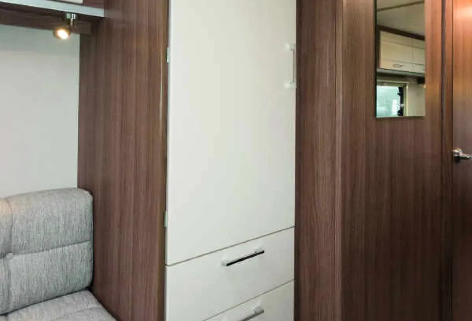 The-fronts-of-the-lower-two-“drawers”-are-hinged-together;-you-open-them-as-one-unit.-two-shelf-spaces-are-Inside--–-perfect-for-shoes.--w600-04031