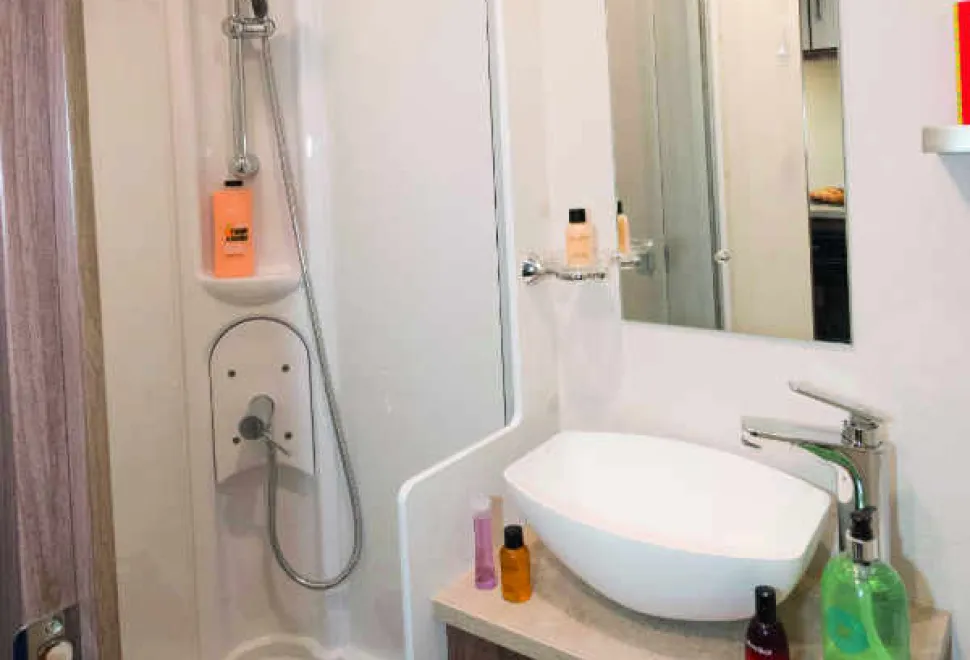 The-wheel-arch-provides-a-little-seat-for-small-caravanners-while-showering!-w600-71779