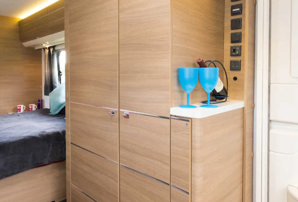web-This-is-the-only-transverse-bed-caravan-to-have-one-wardrobe-rather-than-two.-The-cabinet-alongside-has-seven-shelves-35202